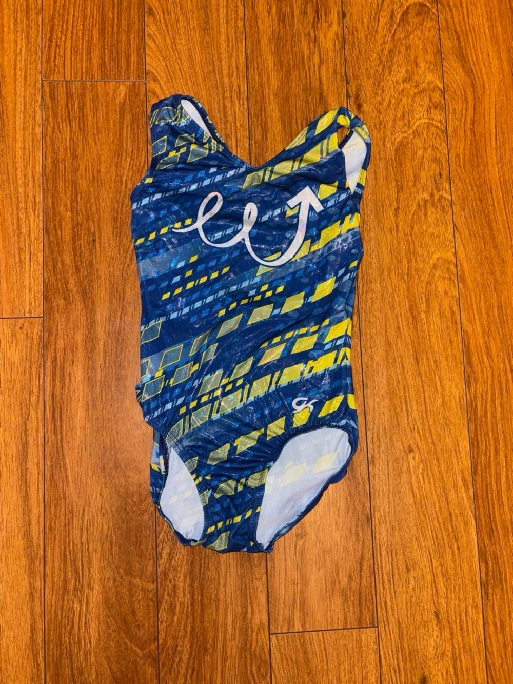 Gymnastics leotard with sparkly blue and yellow design